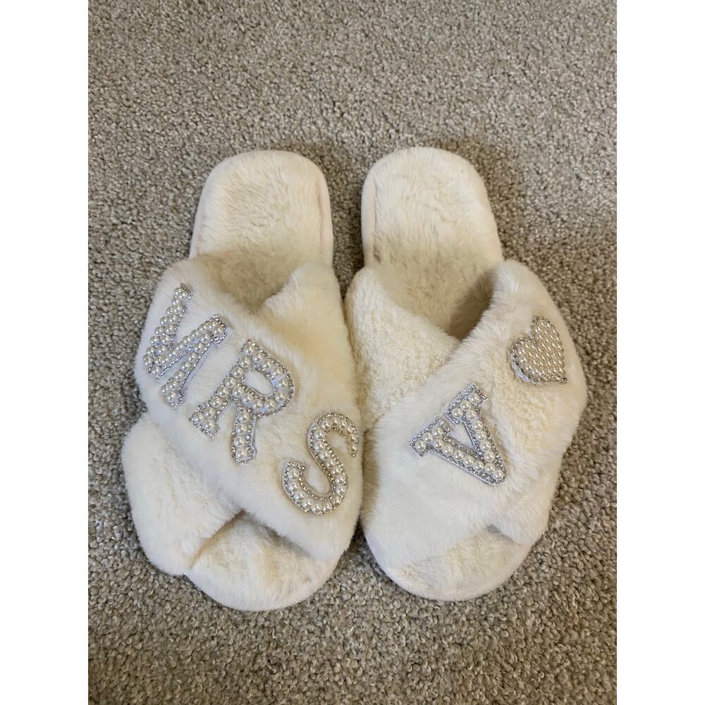 Cozy and elegant Mrs V bridal slippers in soft ivory for wedding